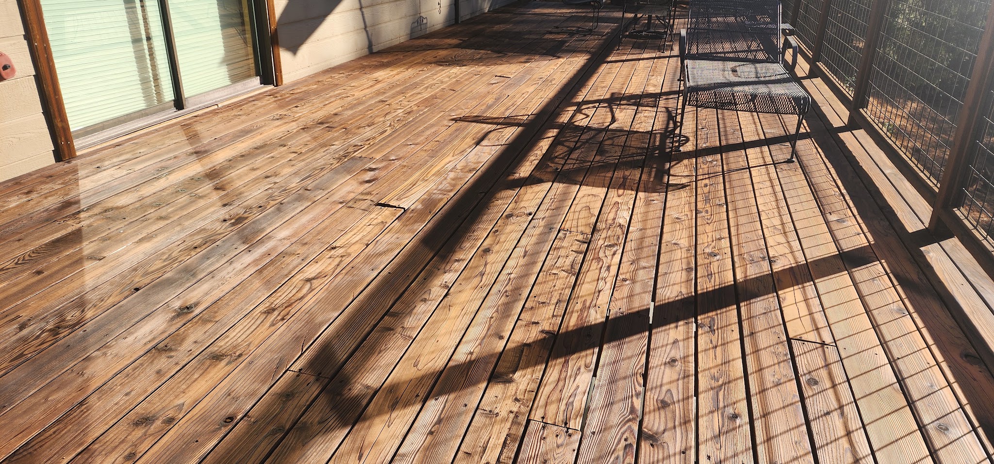 Wood deck freshly stained in a natural tone